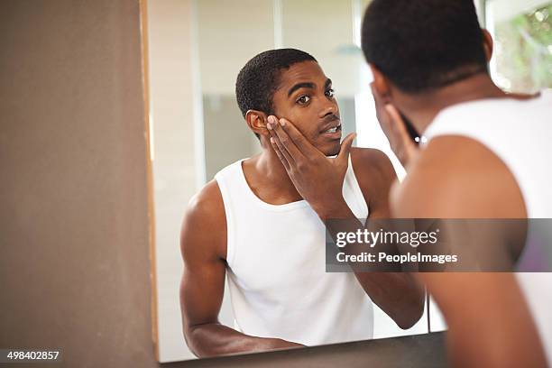 skincare for today's modern man - the perfect male face stock pictures, royalty-free photos & images