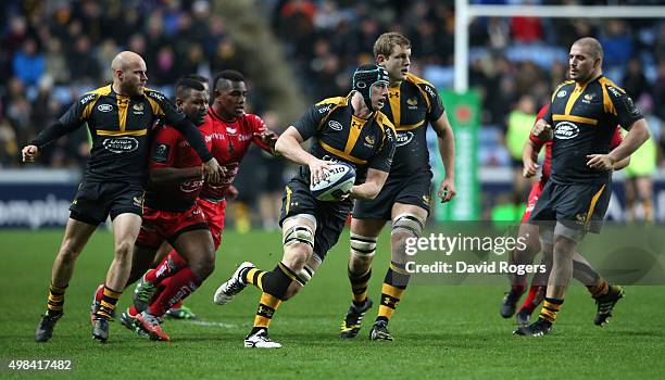 James Gaskell of Wasps breaks with the ball during the European Rugby Champions Cup match between Wasps and Toulon at the Ricoh Arena on November 22,...