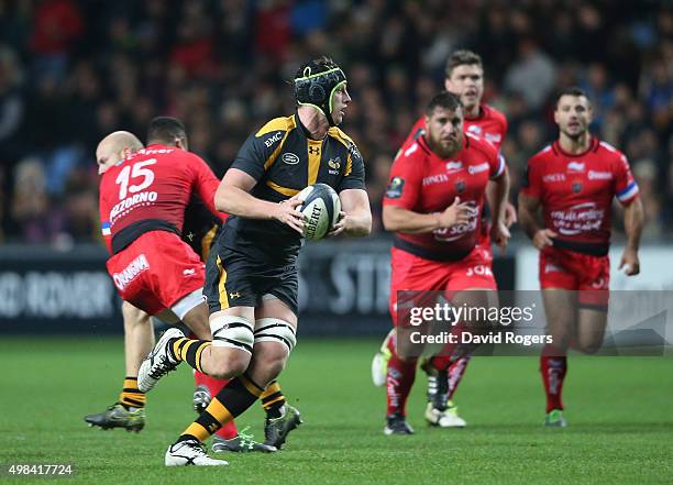 James Gaskell of Wasps breaks with the ball during the European Rugby Champions Cup match between Wasps and Toulon at the Ricoh Arena on November 22,...