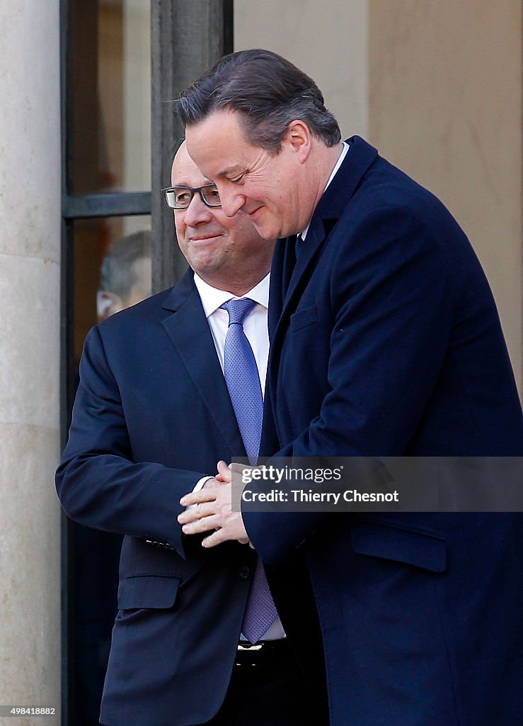 French President Francois Hollande Receives British Prime Minister David Cameron AT Elysee Palace