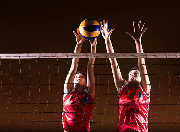 volleyball action. - girls volleyball stock pictures, royalty-free photos & images