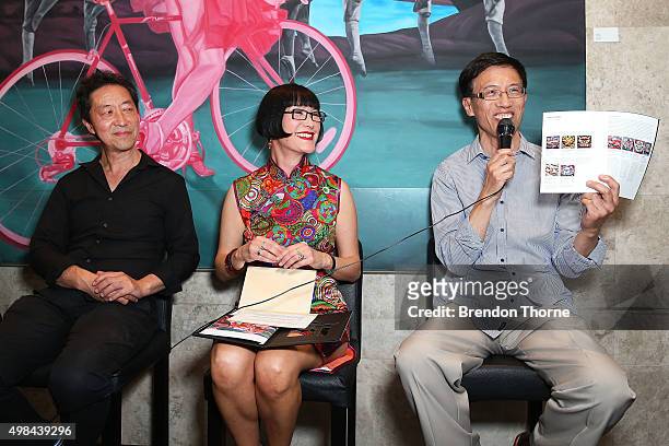 Simon Chan, Claudia Chan Shaw and artist, Fan Dongwang speak during the Chefs Gallery Opening Night at Gallery Restaurant on November 23, 2015 in...