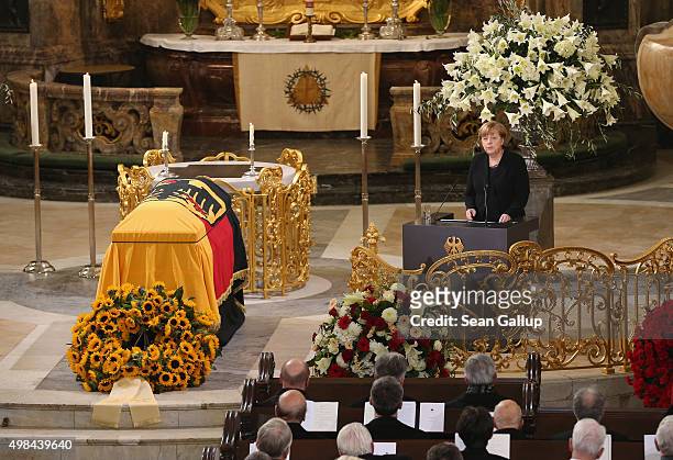 German Chancellor Angela Merkel speaks at the funeral service of former German Chancellor Helmut Schmidt at Sankt Michaelis church on November 23,...