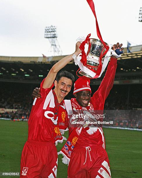 Liverpool goalscorers Ian Rush and Michael Thomas celebrate with the trophy after Liverpool had beaten Sunderland 2-0 to win the 1992 FA Cup Final at...