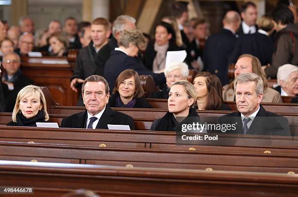 Doris Schroeder-Koepf, Gergard Schroeder, Bettina and Christian Wulff attend the funeral service of former German Chancellor Helmut Schmidt at St...