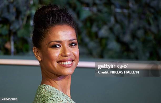 British actress Gugu Mbatha-Raw poses on the red carpet as she attends the 61st London Evening Standard Theatre Awards 2015 in London on November 22,...