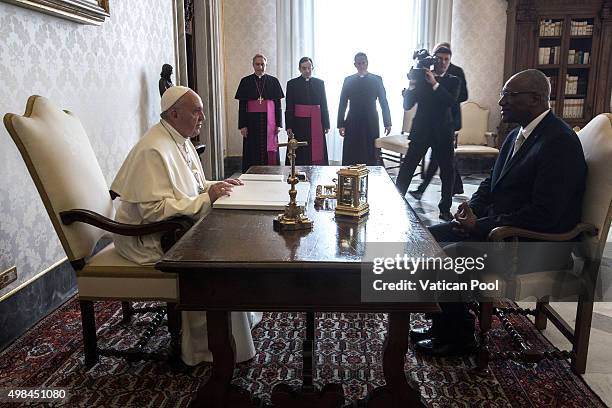 Pope Francis meets Governor-General of Antigua and Barbuda Sir Rodney Williams at his private library in the Apostolic Palace on November 23, 2015 in...