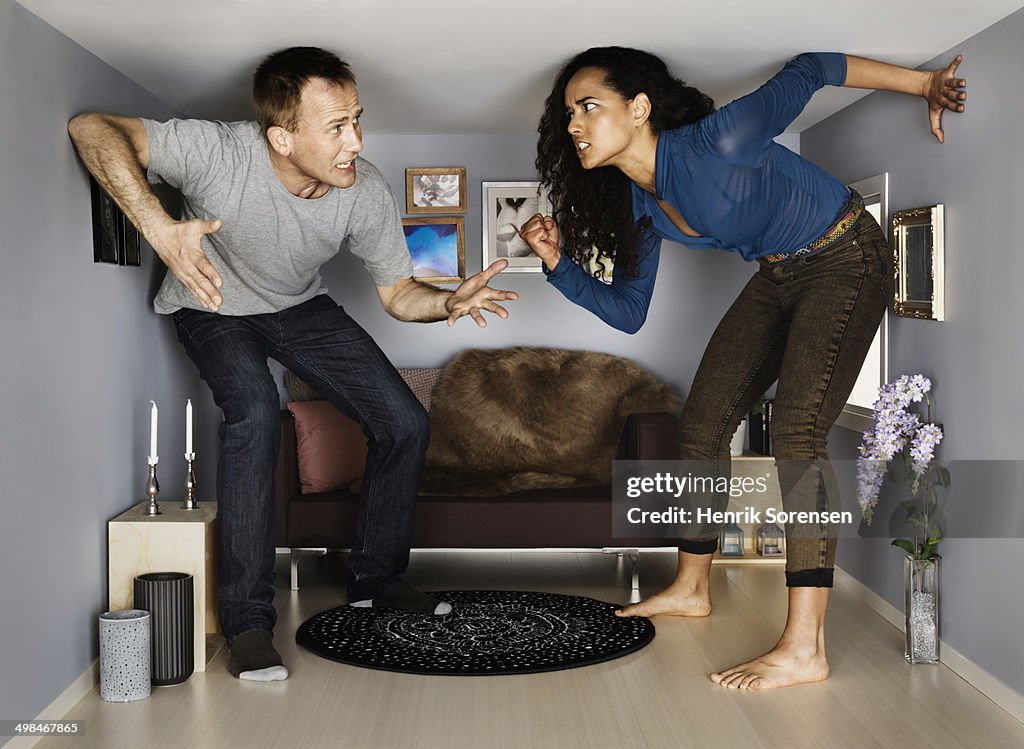 Couple in smallscale living room