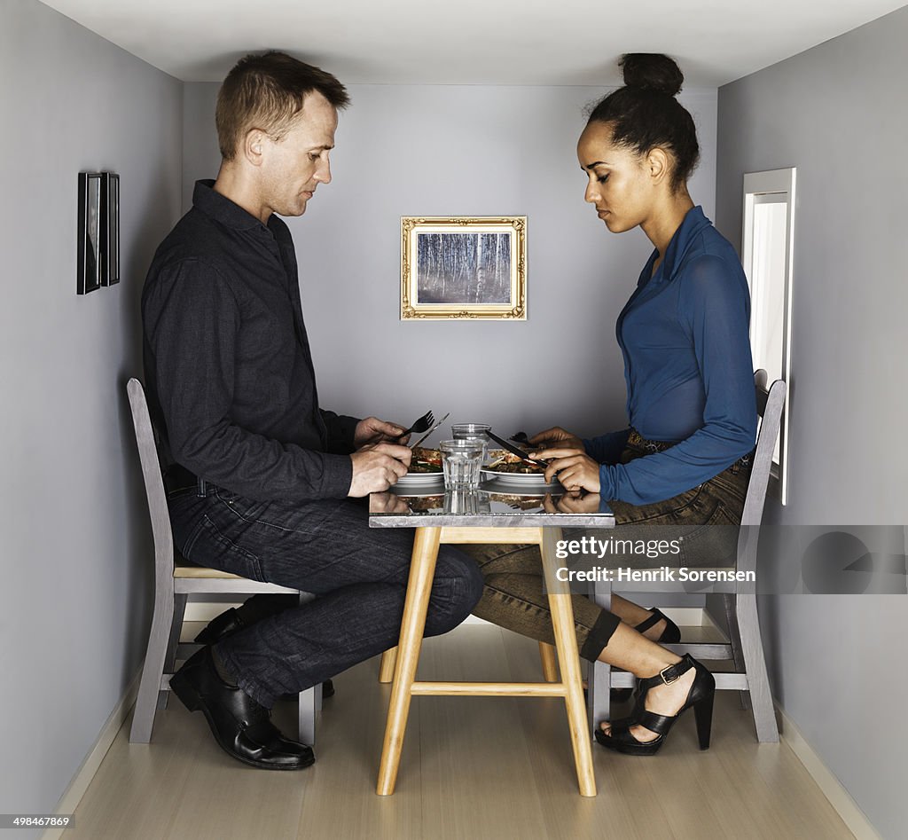 Couple in smallscale dining room