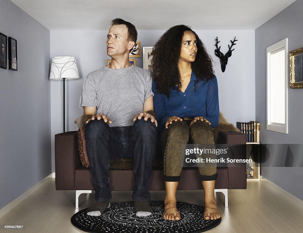 Couple in smallscale living room