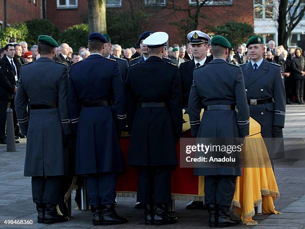 German guards of honor stand at attention during the funeral ceremony of Germany's ex-chancellor Helmut Schmidt at St. Michael's Church in Hamburg,...