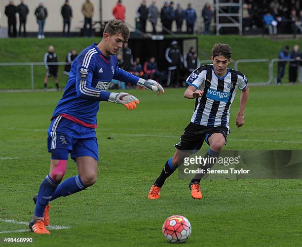 Lewis McNall of Newcastle looks to close down the West Brom Keeper Alex Palmer in his debut for the U21 team during the U21 Premier League Match...