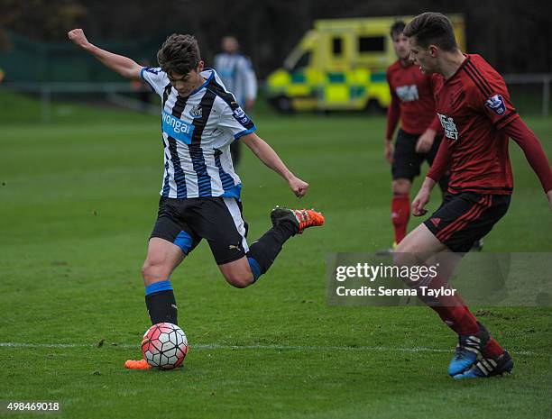 Lewis McNall of Newcastle strikes the ball in his debut for the U21 team during the U21 Premier League Match between Newcastle United and West...