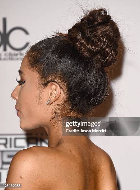 Recording artist Ariana Grande, winner of Favorite Pop/Rock Female Artist, poses in the press room during the 2015 American Music Awards at Microsoft...