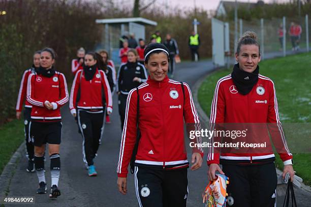 Bianca Schmidt and Simone Laudehr of Germany on the way to the training session ahead of the friendly match between Women's Germany Team and Women's...