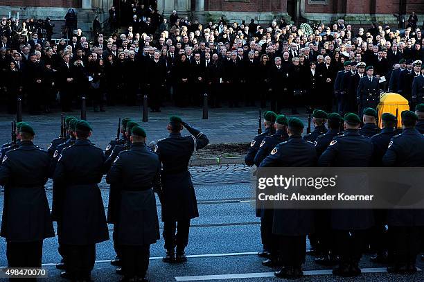 German President Joachim Gauck, Susanne Schmidt, Angela Merkel, Ruth Loah among others watch Pallbearers carry the coffin of former German Chancellor...