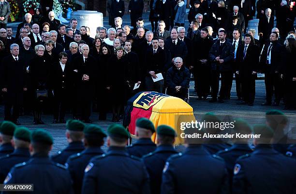 German President Joachim Gauck, Susanne Schmidt, Angela Merkel, Ruth Loah watch Pallbearers carry the coffin of former German Chancellor Helmut...