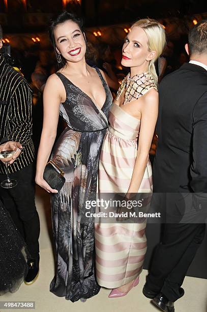 Daisy Lowe and Poppy Delevingne attend a drinks reception at the British Fashion Awards in partnership with Swarovski at the London Coliseum on...