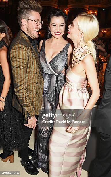 Henry Holland, Daisy Lowe and Poppy Delevingne attend a drinks reception at the British Fashion Awards in partnership with Swarovski at the London...