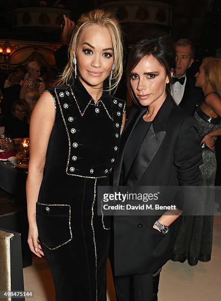 Rita Ora and Victoria Beckham attend a drinks reception at the British Fashion Awards in partnership with Swarovski at the London Coliseum on...