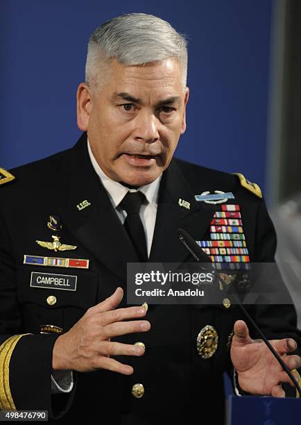 Commander of the Resolute Support Mission and United States Forces - Afghanistan, US General John F. Campbell speaks during a meeting on NATO-led...