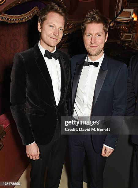 Simon Woods and Christopher Bailey attend a drinks reception at the British Fashion Awards in partnership with Swarovski at the London Coliseum on...