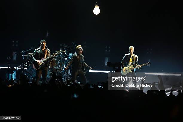 Musicians The Edge, Larry Mullen Jr., Bono and Adam Clayton of U2 perform onstage during of U2 performs at 3 Arena on November 23, 2015 in Dublin,...