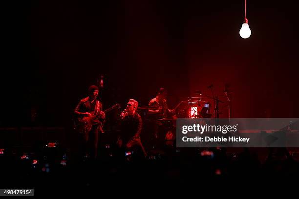 Musicians The Edge, Larry Mullen Jr., Bono and Adam Clayton of U2 perform onstage during of U2 performs at 3 Arena on November 23, 2015 in Dublin,...