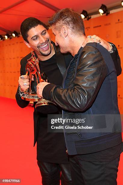 Andreas Bourani and Hartmut Engler with award during at the Bambi Awards 2015 winners board at Stage Theater on November 12, 2015 in Berlin, Germany.