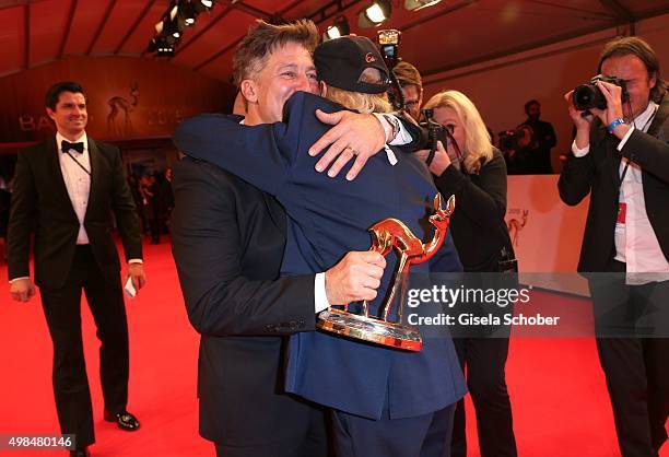 Tobias Moretti and Otto Waalkes with award during at the Bambi Awards 2015 winners board at Stage Theater on November 12, 2015 in Berlin, Germany.
