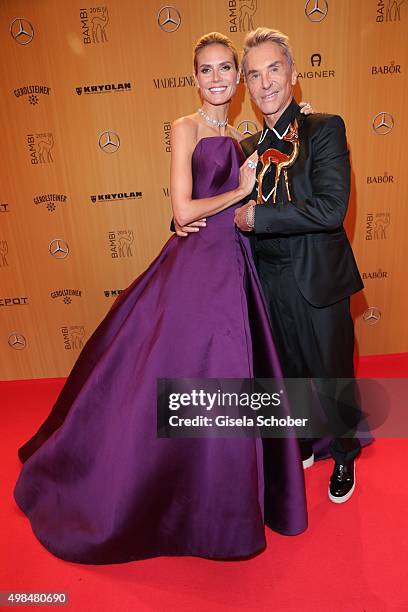Heidi Klum wearing a dress by Zac Posen and Wolfgang Joop with award during at the Bambi Awards 2015 winners board at Stage Theater on November 12,...