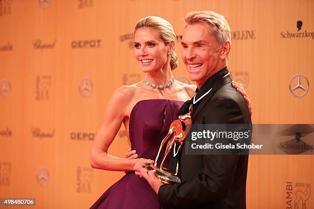 Heidi Klum and Wolfgang Joop with award during at the Bambi Awards 2015 winners board at Stage Theater on November 12, 2015 in Berlin, Germany.