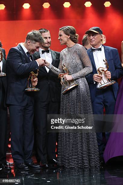 Tobias Moretti and Hilary Swank on stage during the Bambi Awards 2015 show at Stage Theater on November 12, 2015 in Berlin, Germany.