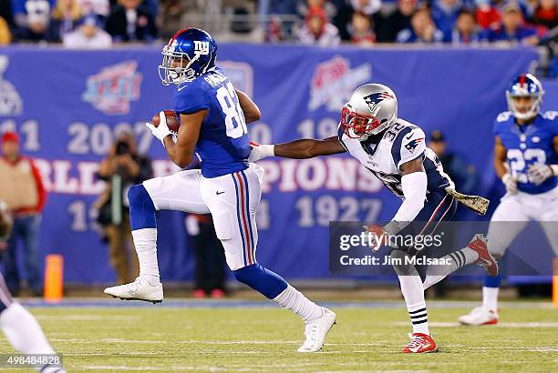 Rueben Randle of the New York Giants in action against Devin McCourty of the New England Patriots on November 15, 2015 at MetLife Stadium in East...