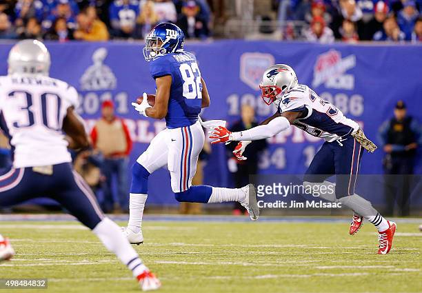 Rueben Randle of the New York Giants in action against Devin McCourty of the New England Patriots on November 15, 2015 at MetLife Stadium in East...
