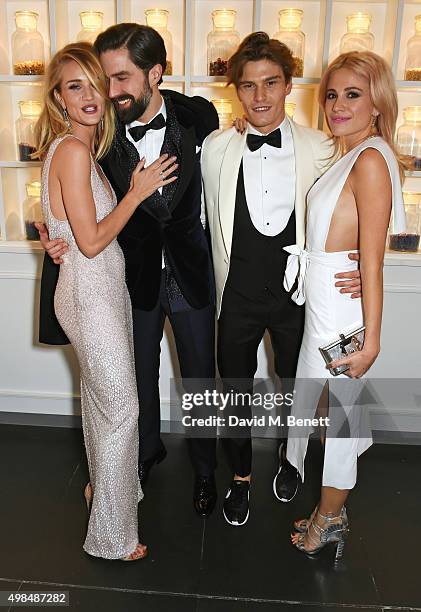 Rosie Huntington-Whiteley, Jack Guinness, Olivier Cheshire and Pixie Lott attend the British Fashion Awards official afterparty hosted by St Martins...