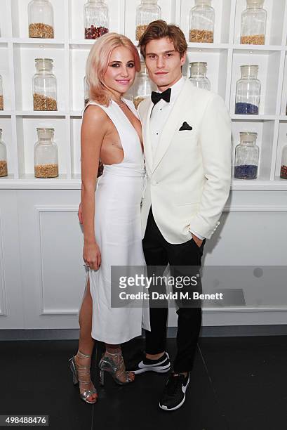 Pixie Lott and Oliver Cheshire attend the British Fashion Awards official afterparty hosted by St Martins Lane and sponsored by Ciroc Vodka at St...