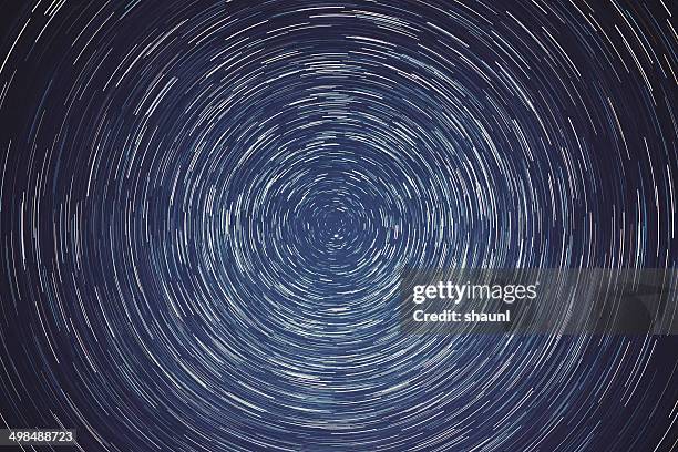 center of the axis - long exposure stars stock pictures, royalty-free photos & images