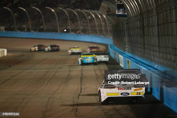 Drivers race during the NASCAR Sprint Cup Series Quicken Loans Race for Heroes 500 at Phoenix International Raceway on November 15, 2015 in Avondale,...