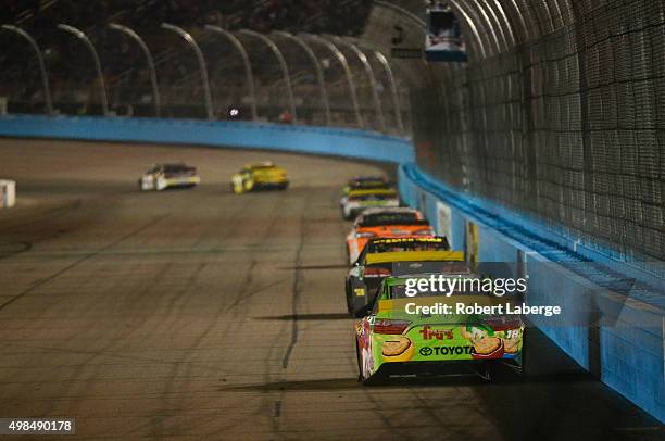 Drivers race during the NASCAR Sprint Cup Series Quicken Loans Race for Heroes 500 at Phoenix International Raceway on November 15, 2015 in Avondale,...