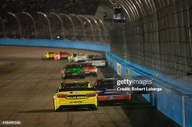 Drivers race during the NASCAR Sprint Cup Series Quicken Loans Race for Heroes 500 at Phoenix International Raceway on November 15, 2015 in Avondale,...