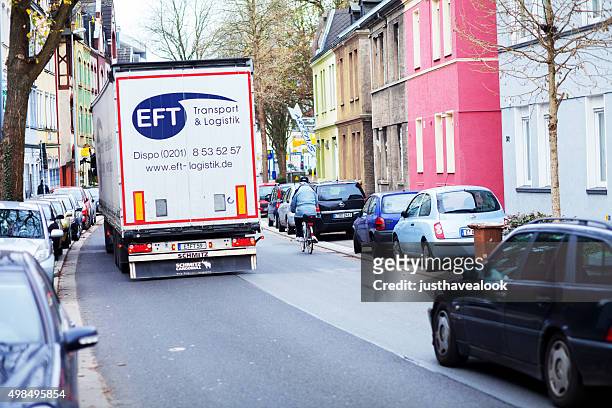 big truck is over running  senior on bicycle - senior essen stock pictures, royalty-free photos & images