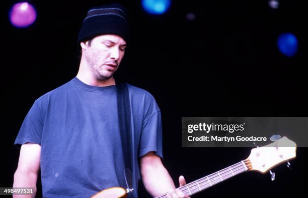 Keanu Reeves performs on stage with his band Dogstar, Glastonbury Festival, United Kingdom, 1994.