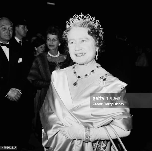 The Queen Mother attends a performance at RADA , to celebrate the drama school's Diamond Jubilee , London, UK, November 1964.