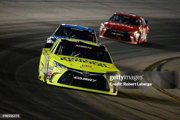 Erik Jones, driver of the Dollar General Toyota, races during the NASCAR Sprint Cup Series Quicken Loans Race for Heroes 500 at Phoenix International...