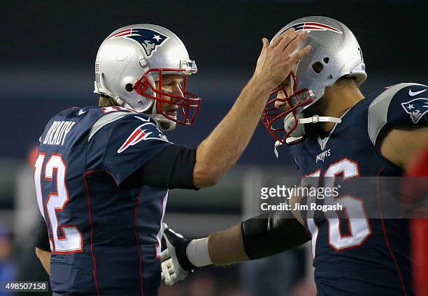 Tom Brady of the New England Patriots reacts with Sebastian Vollmer before a game against the Buffalo Bills at Gillette Stadium on November 23, 2015...