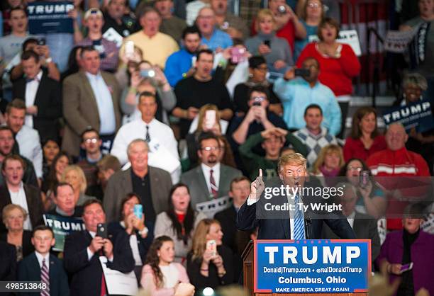 Republican presidential candidate Donald Trump addresses supporters during a campaign rally at the Greater Columbus Convention Center on November 23,...