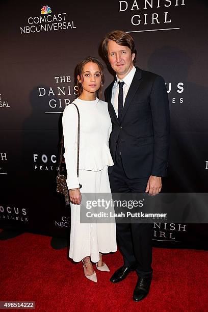 Actress Alicia Vikander and director Tom Hooper attend the premiere of "The Danish Girl", commemorating the Annual Transgender Day of Remembrance at...