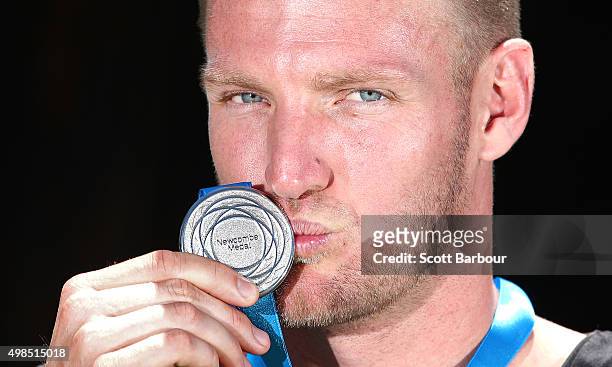 Sam Groth poses with the Newcombe Medal at Melbourne Park on November 24, 2015 in Melbourne, Australia.