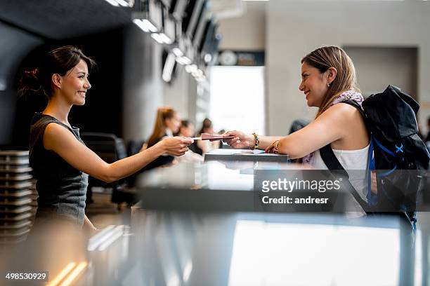 woman at the airport - travel service stockfoto's en -beelden